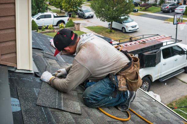 Professional Metal Roofing technician working in Reading, MA